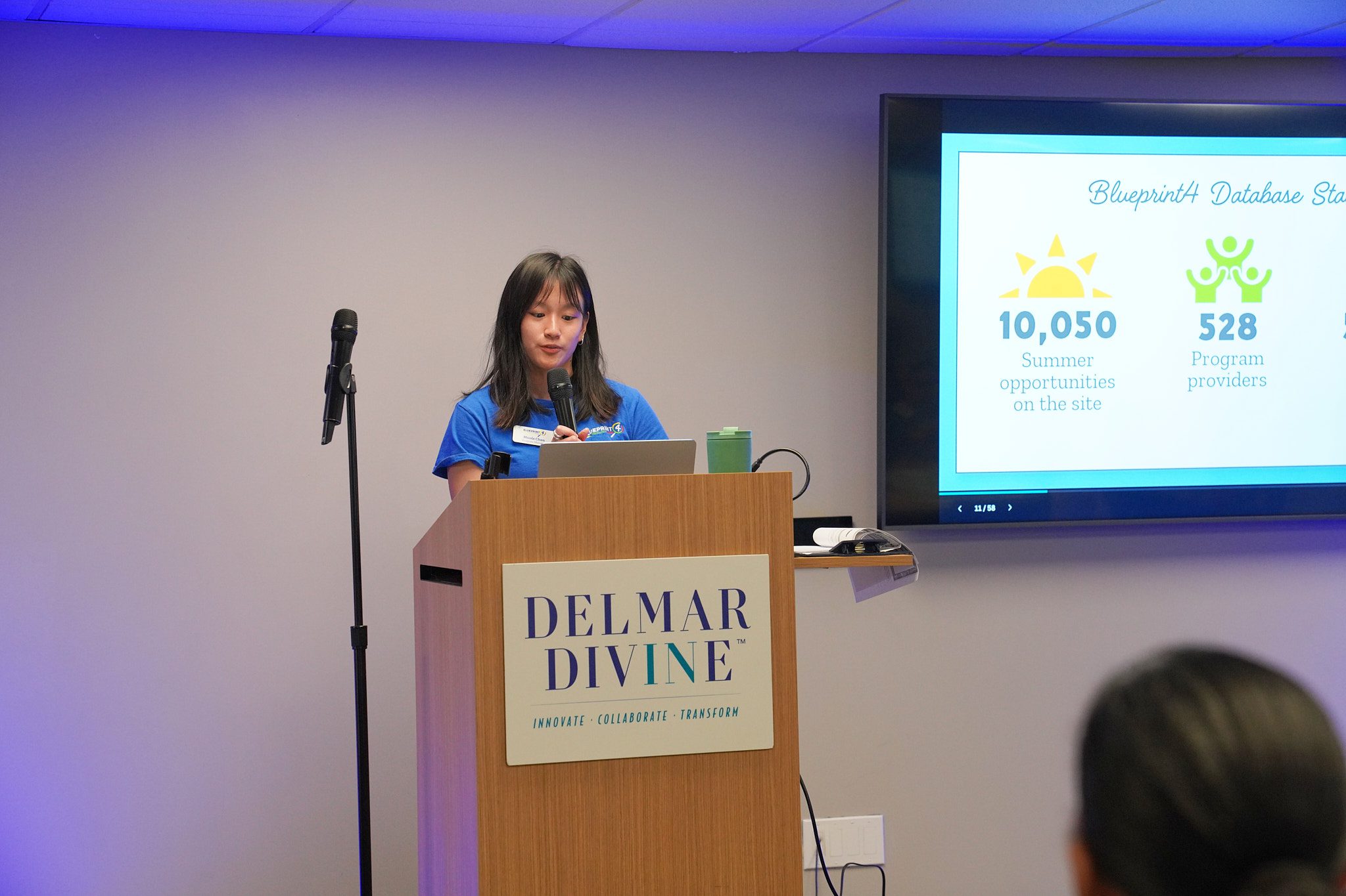 Program Coordinator Nicole Chen presents on database statistics from the past year.